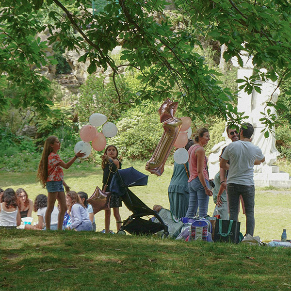 a family enjoying a picnic in a park